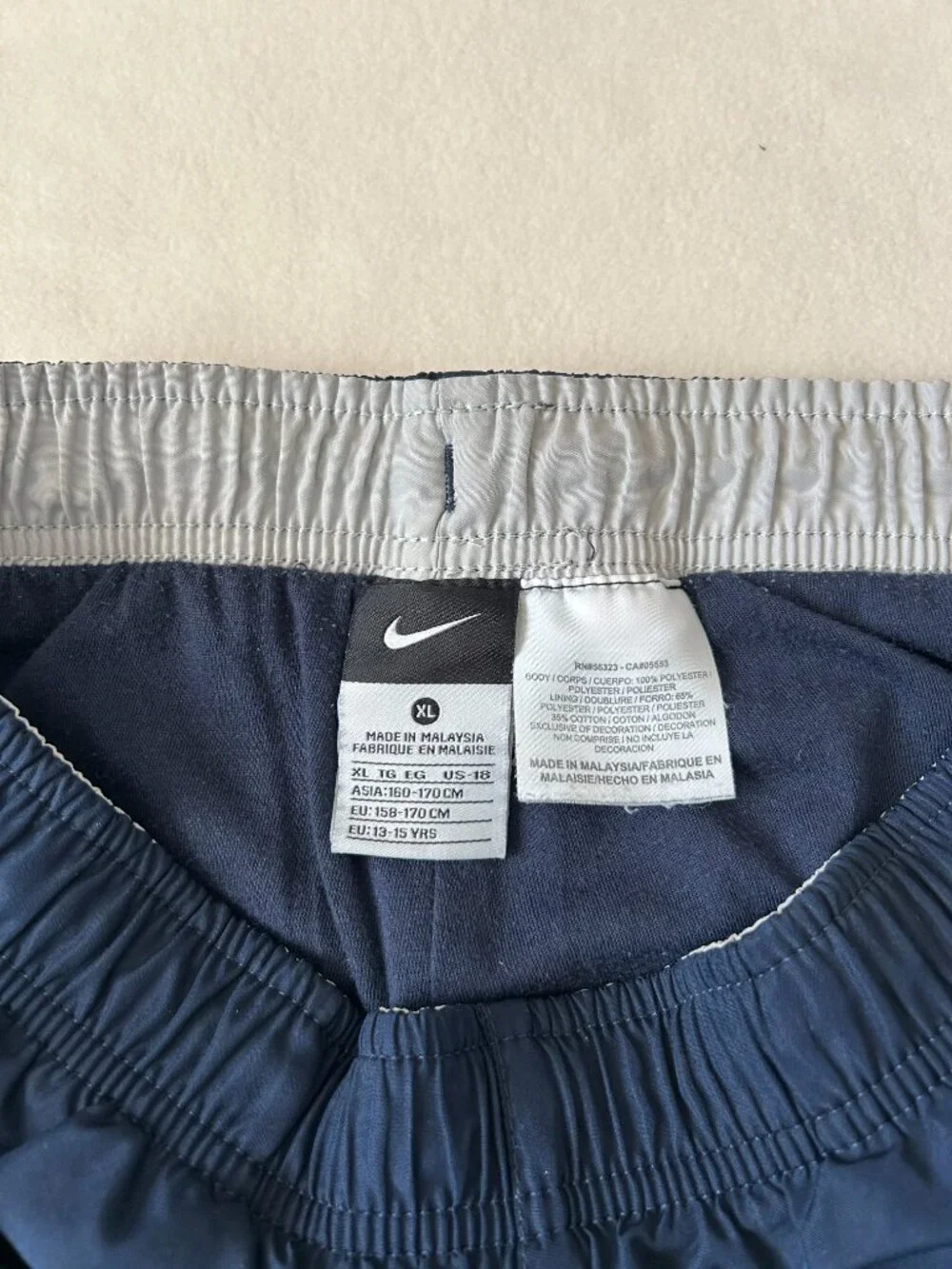 Vintage Nike Navy Blue Track Pants with White Stripe